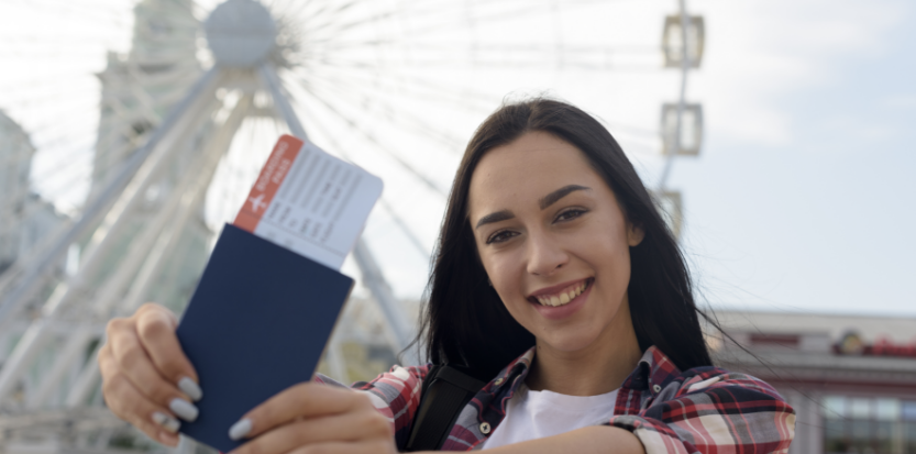 women-showing-air-ticket-for-study-in-australia